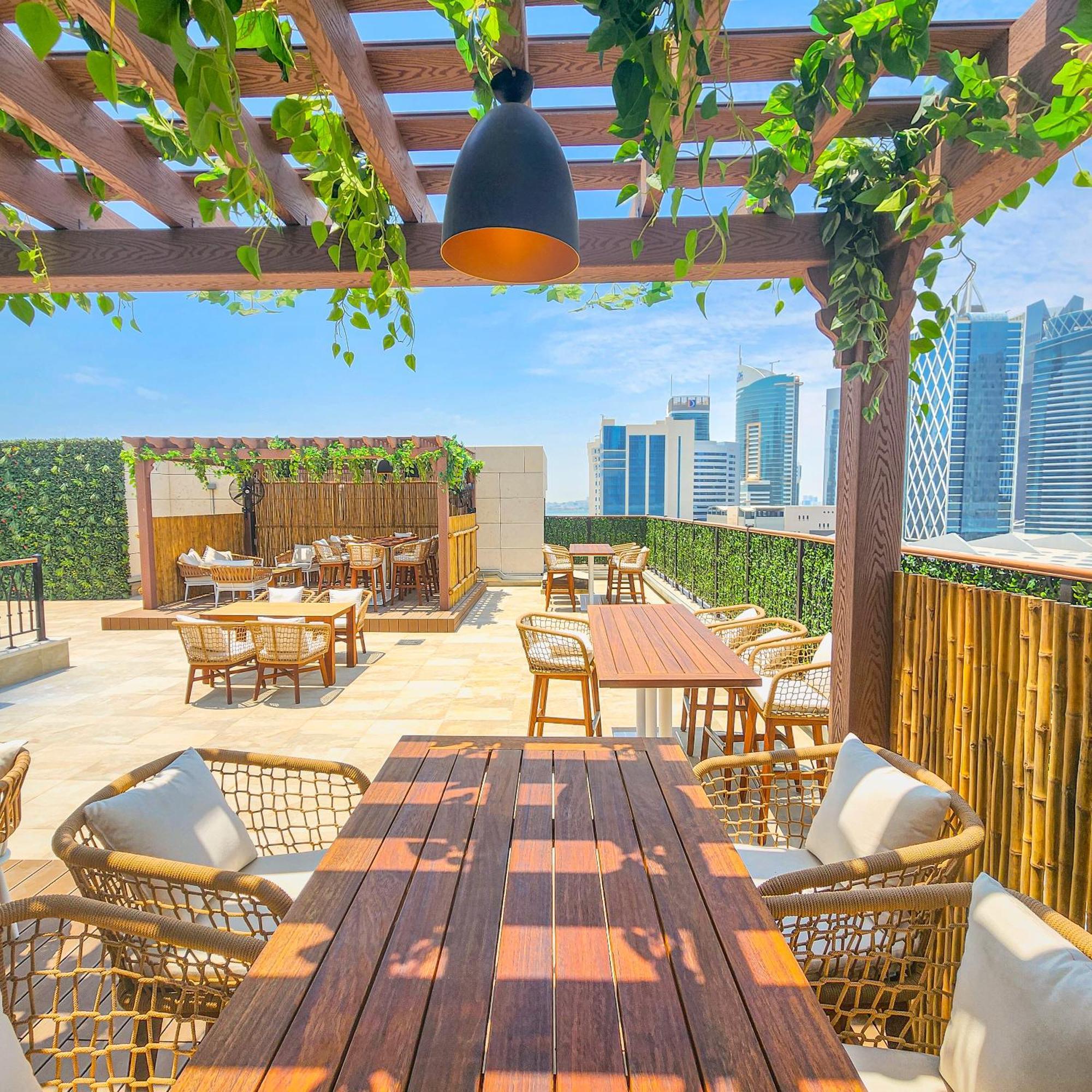 City Centre Rotana דוחה מראה חיצוני תמונה The rooftop bar at the hotel